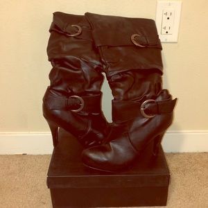 Black leather boots with heel